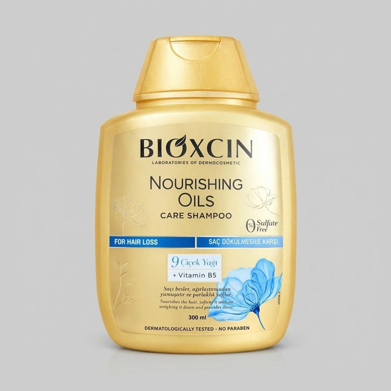 شامپو تقویتکننده و ترمیمکننده مو بیوکسین مدل Nourishing Oils Care حجم 300 میلیلیتر، مناسب انواع مو، فاقد سولفات و پارابن، حاوی 9 نوع روغن گیاهی و ویتامین B5، ملایم و مغذی